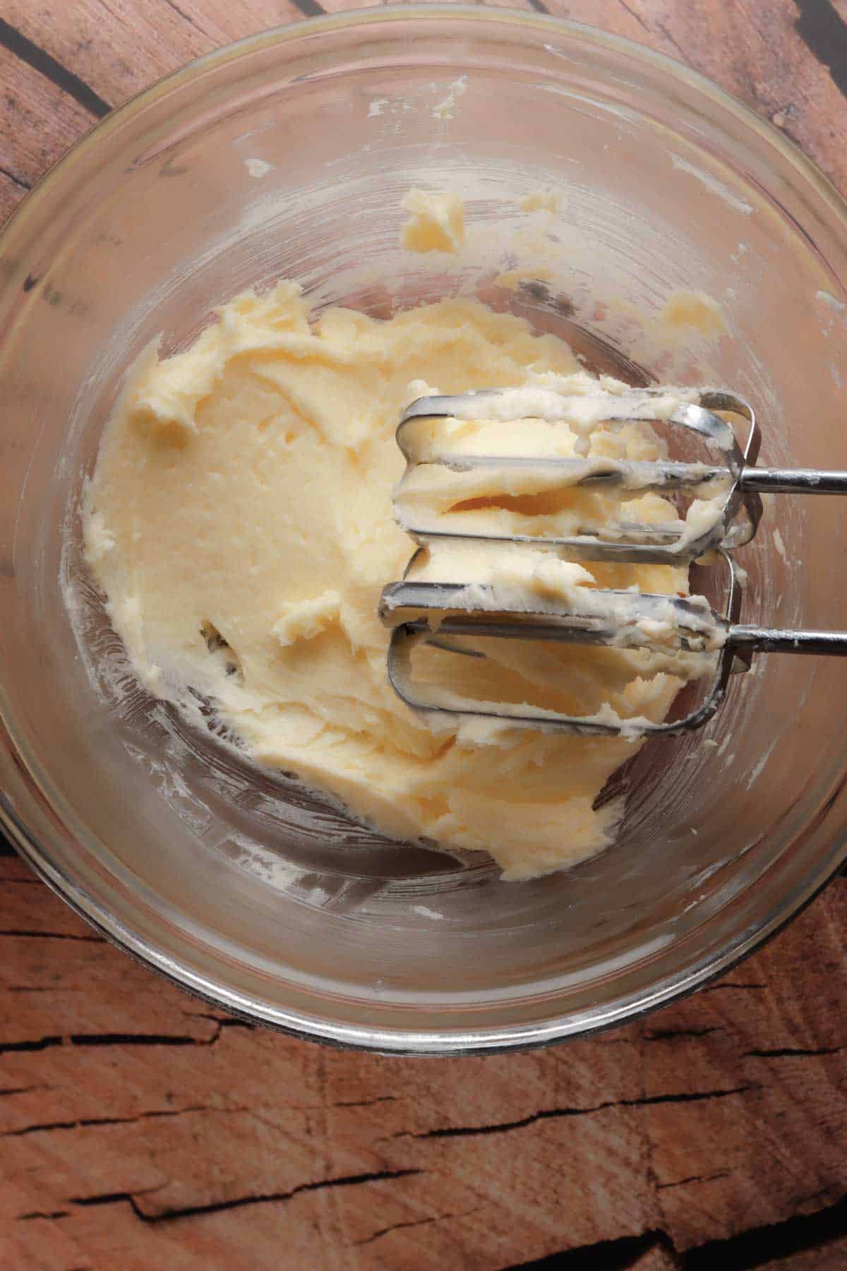 Butter and sugar mixed for preparing the sweet pineapple tamales.