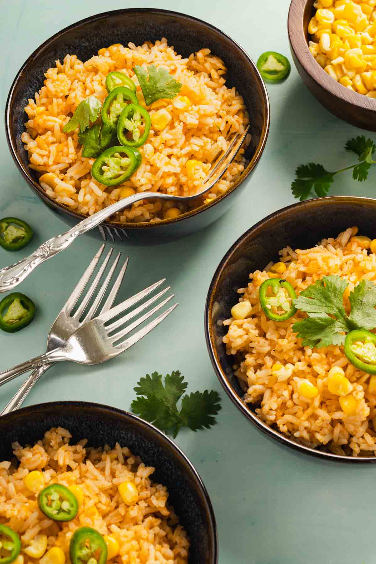 Three bowls of Red Mexican Rice.