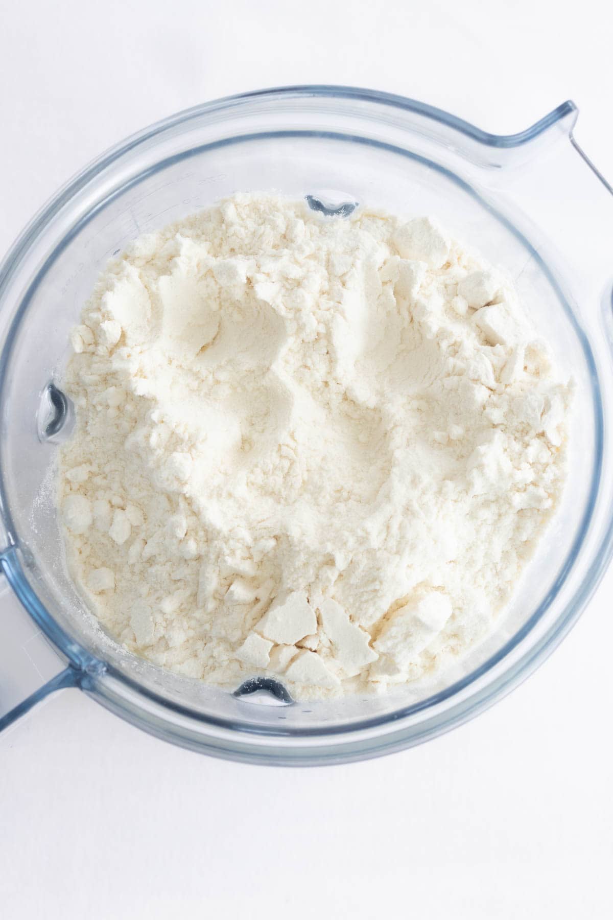 Blending Mexican Sweet Corn Cake ingredients in blender.