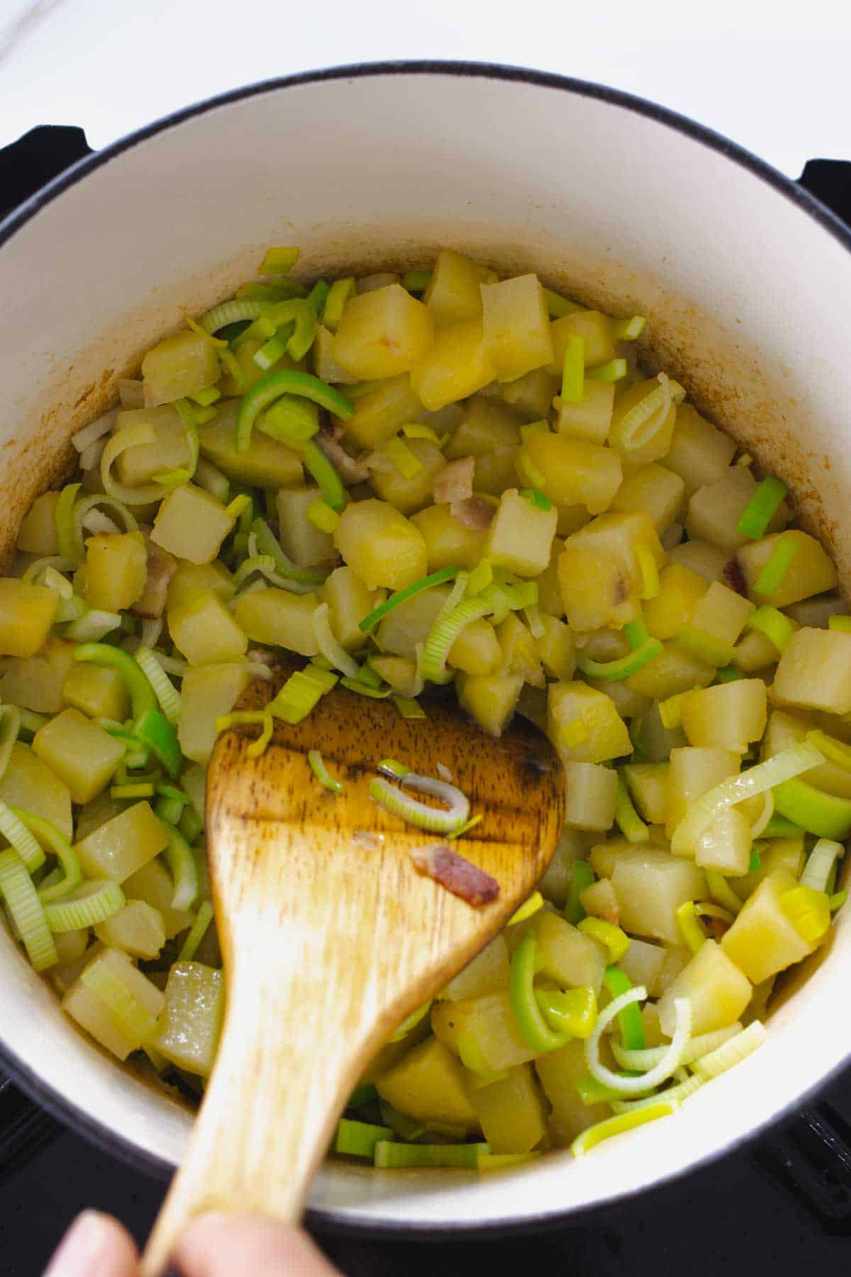 Potato and Leek Soup-cooking potatoes,bacon and leeks