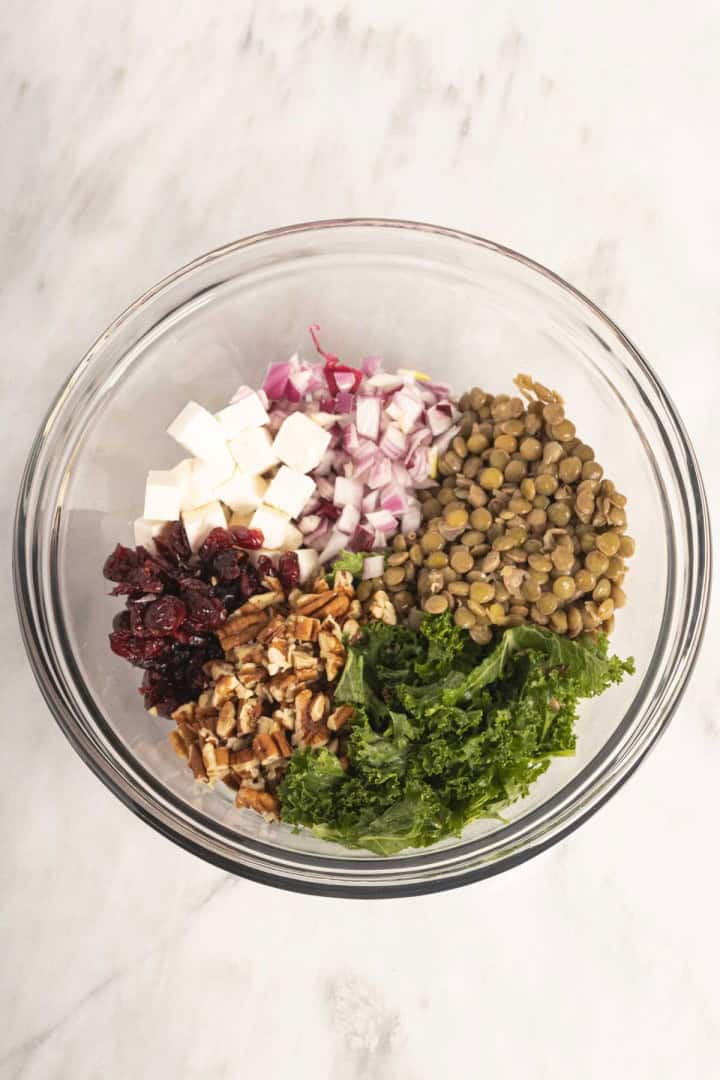Lentil and kale salad ingredients in a bowl