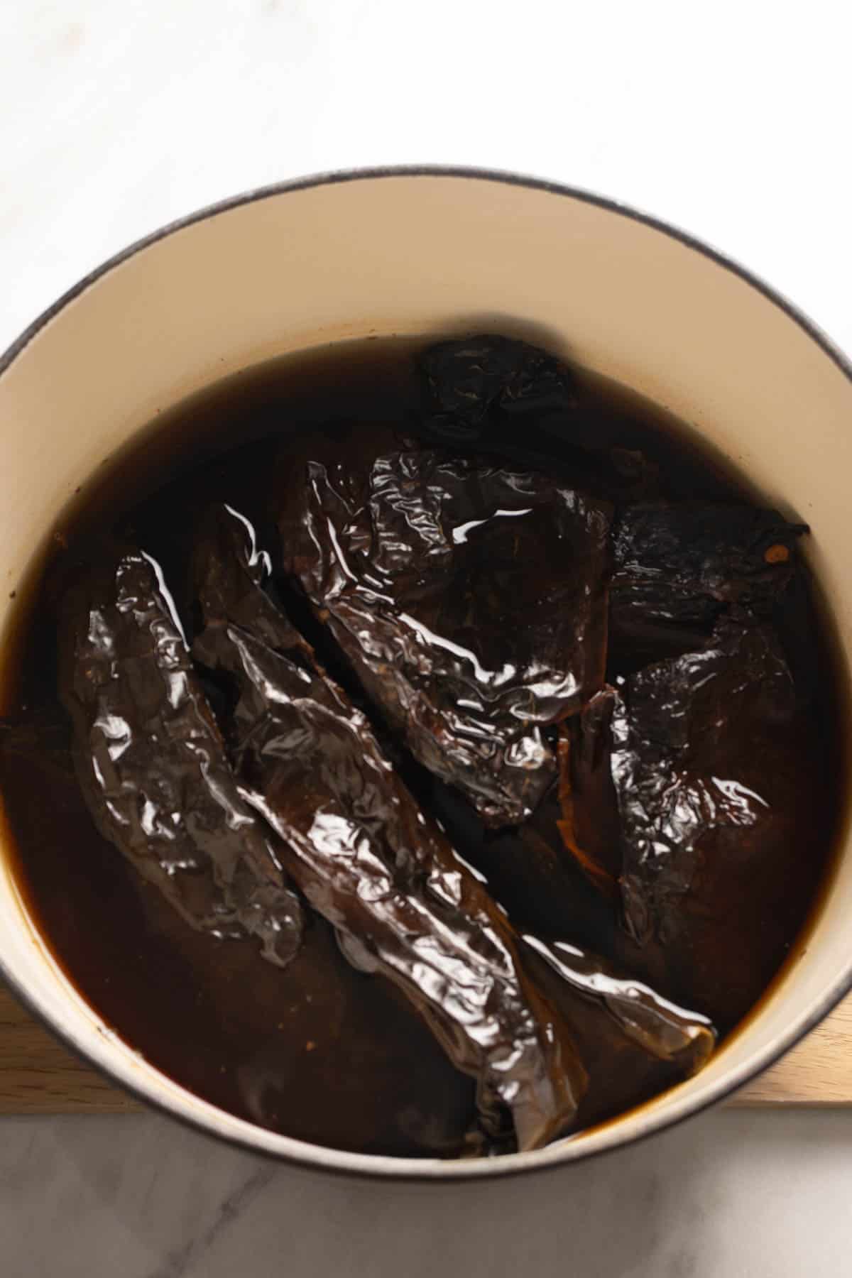 Soaking the chiles for the Red Mole sauce