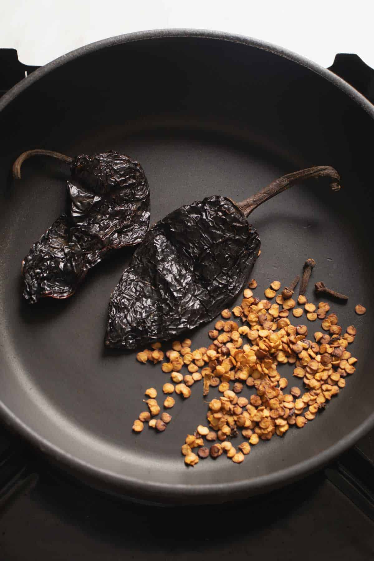 Toasting the chiles and seeds for the Red Mole sauce- not nuts or peanuts