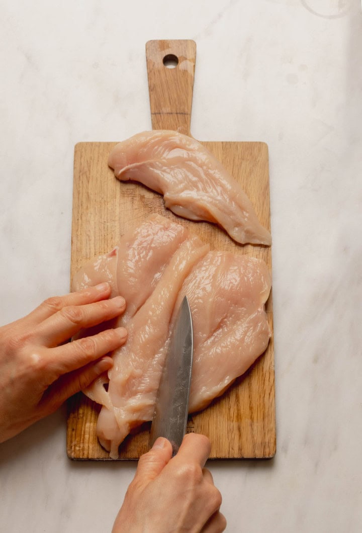 Getting the chicken prepared for the Grilled Mexican Chicken Marinade.