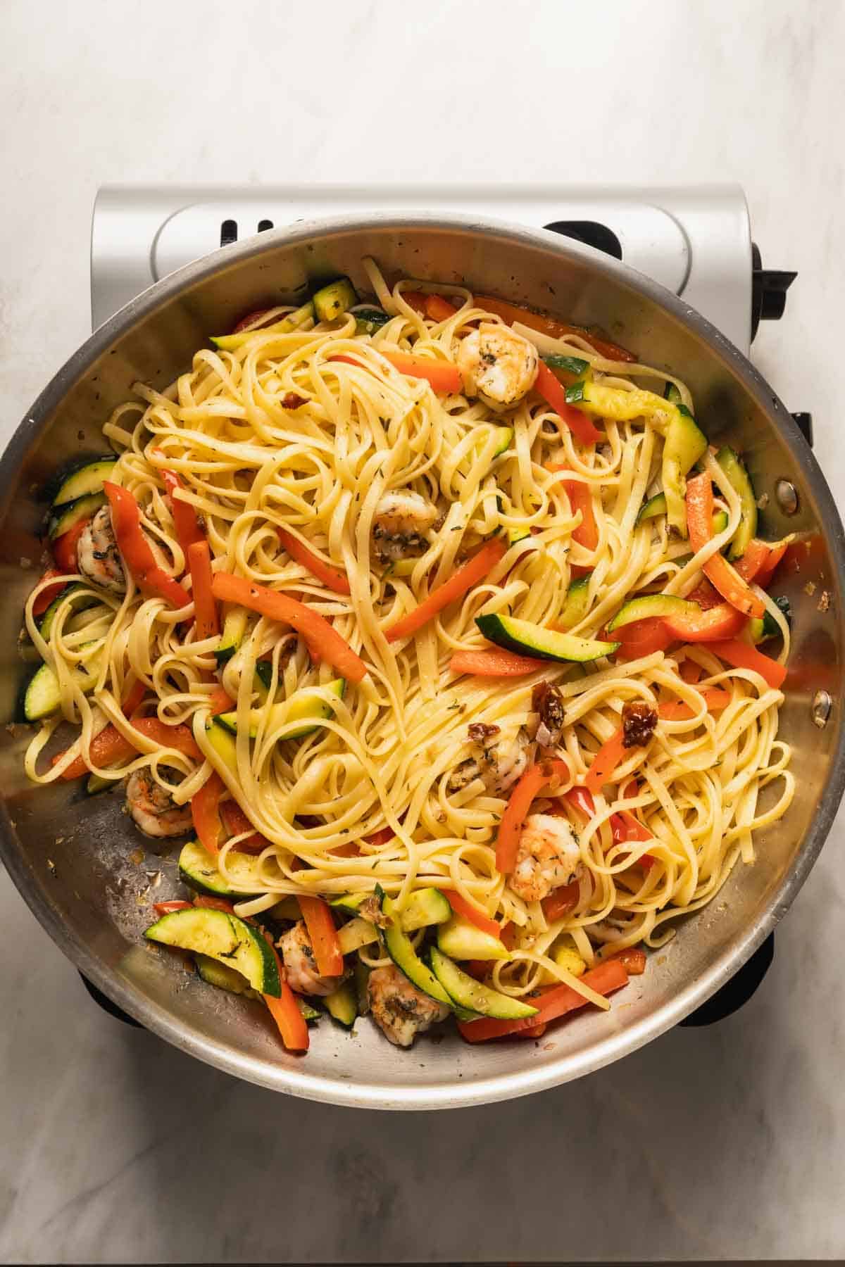 All ingredients been cooked in pan for making the pasta.