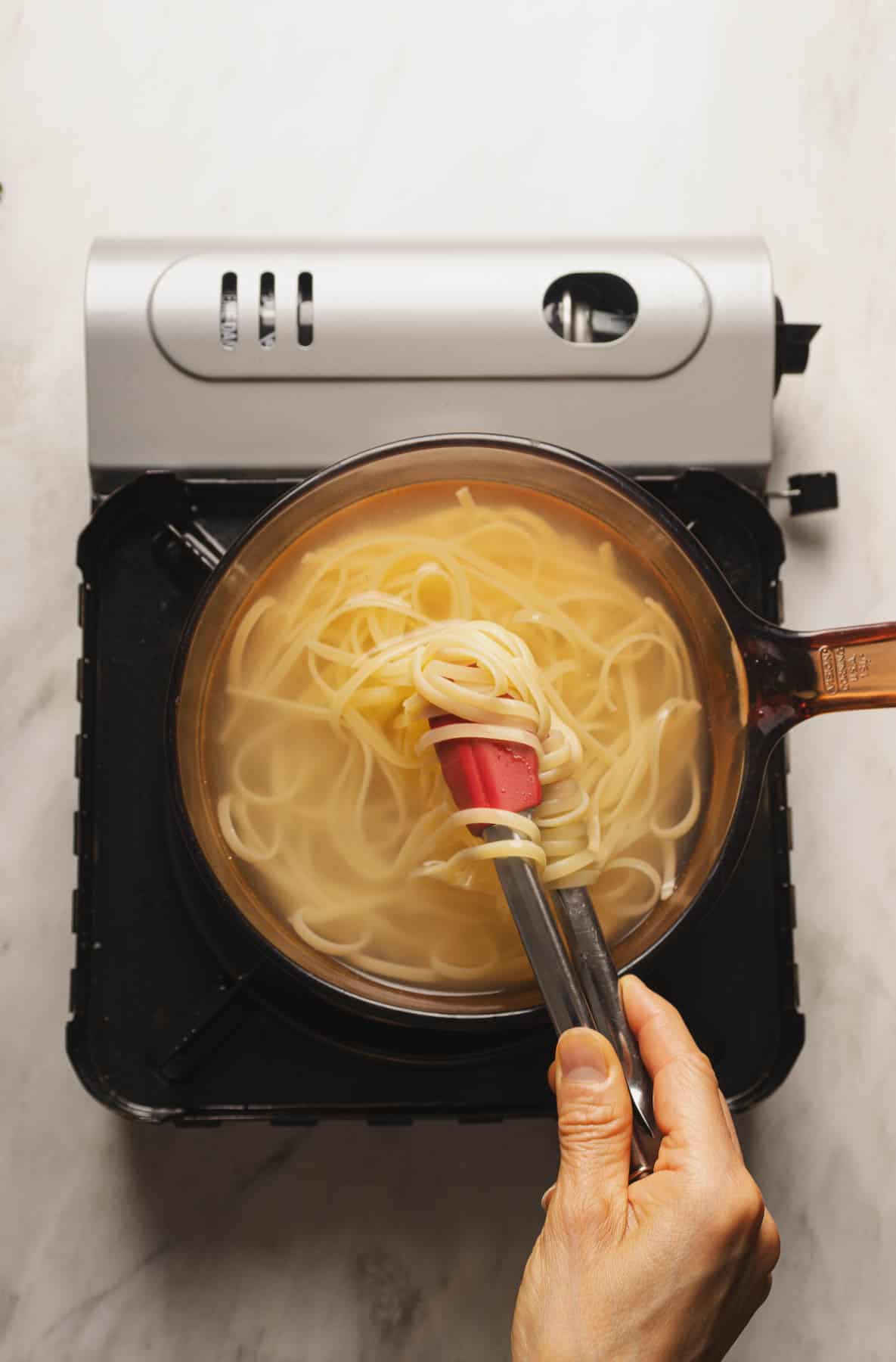 Cooking the pasta.