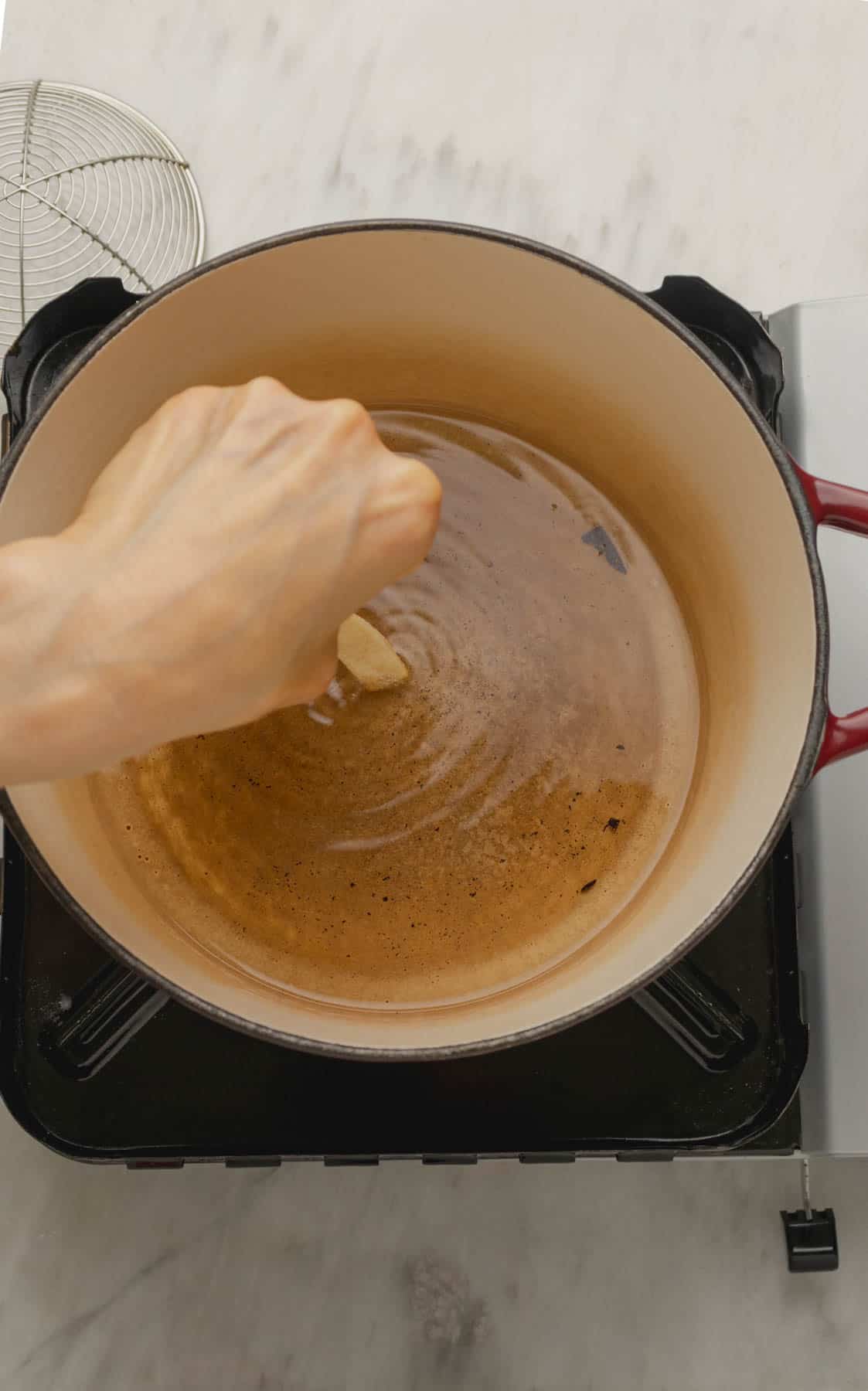 Testing if oil is warm enough.