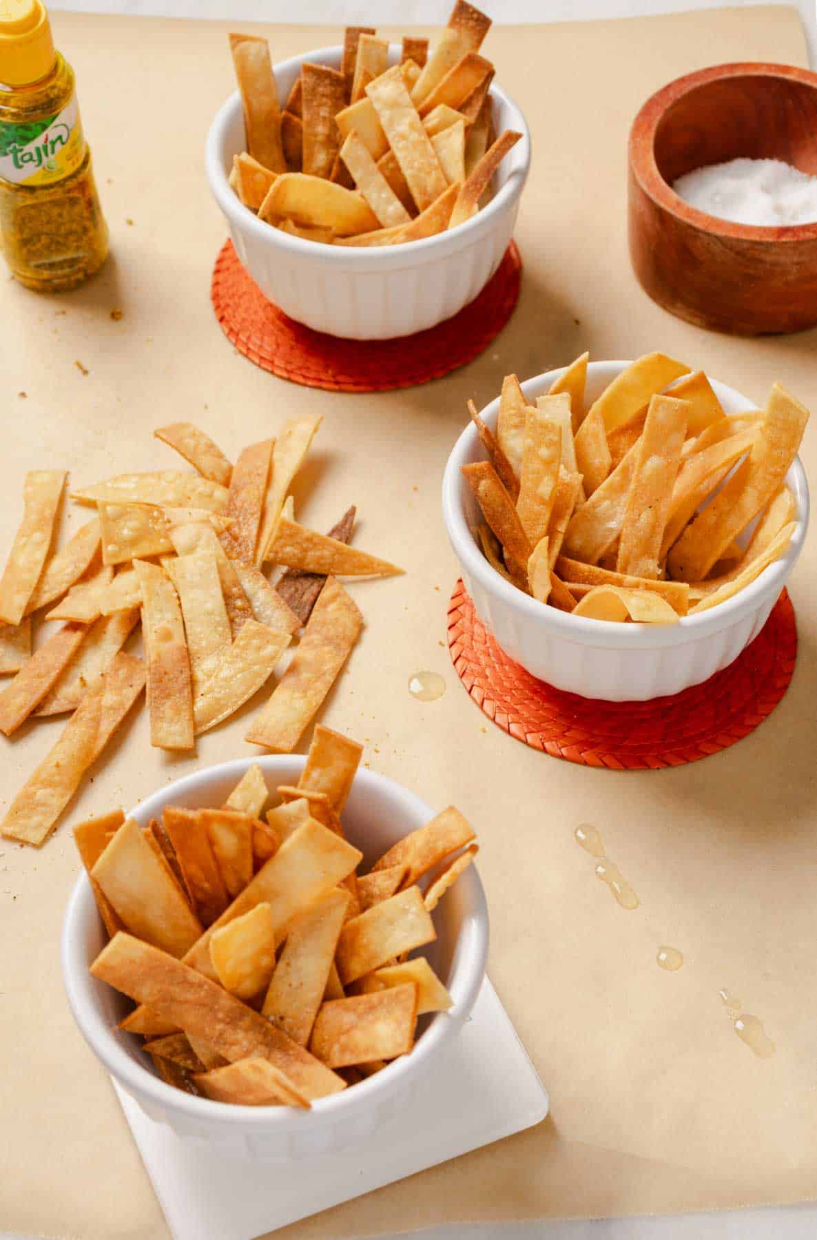 Crispy Tortilla strips served in 3 bowls.