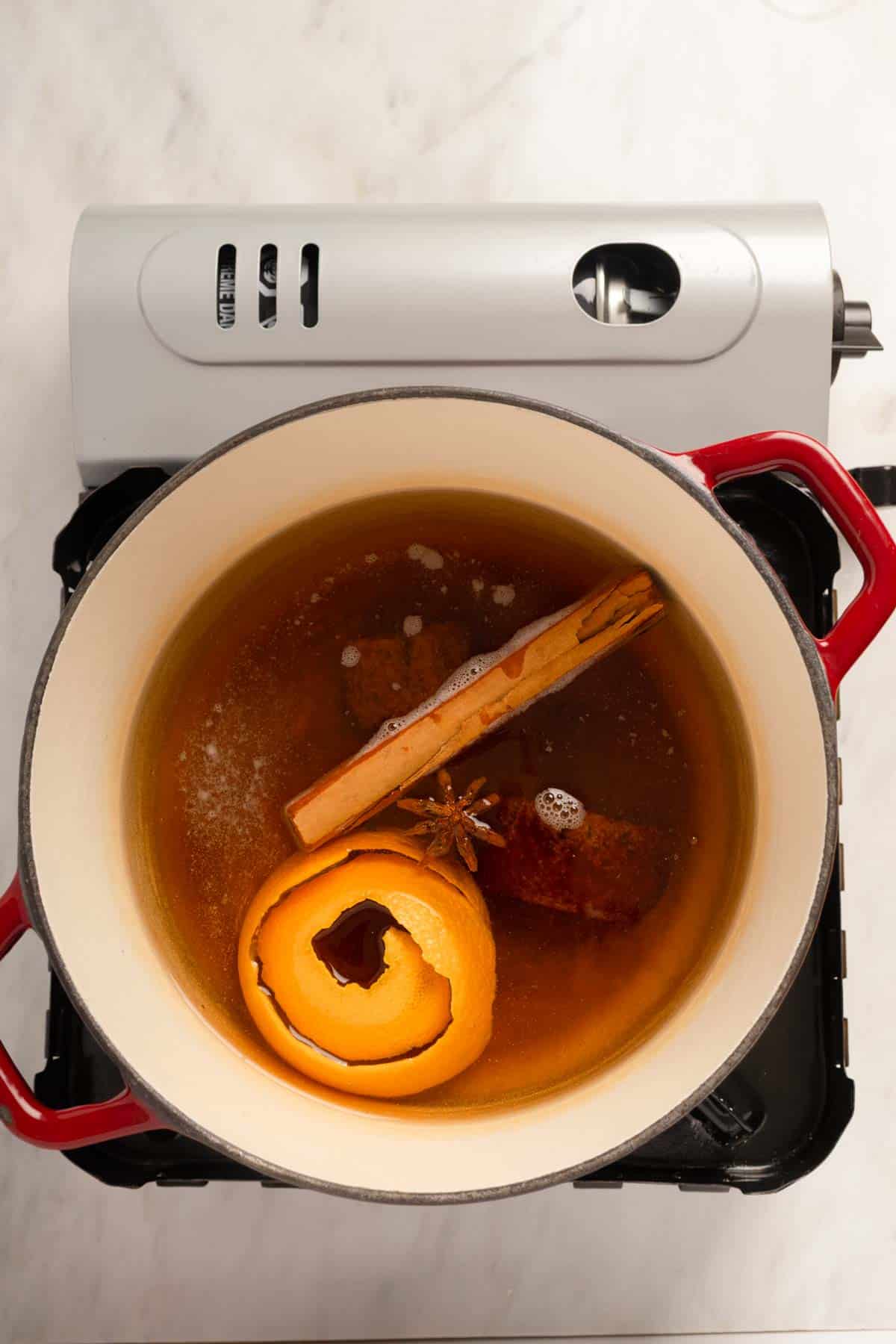 All ingredients except ground coffee added to a pot with water.