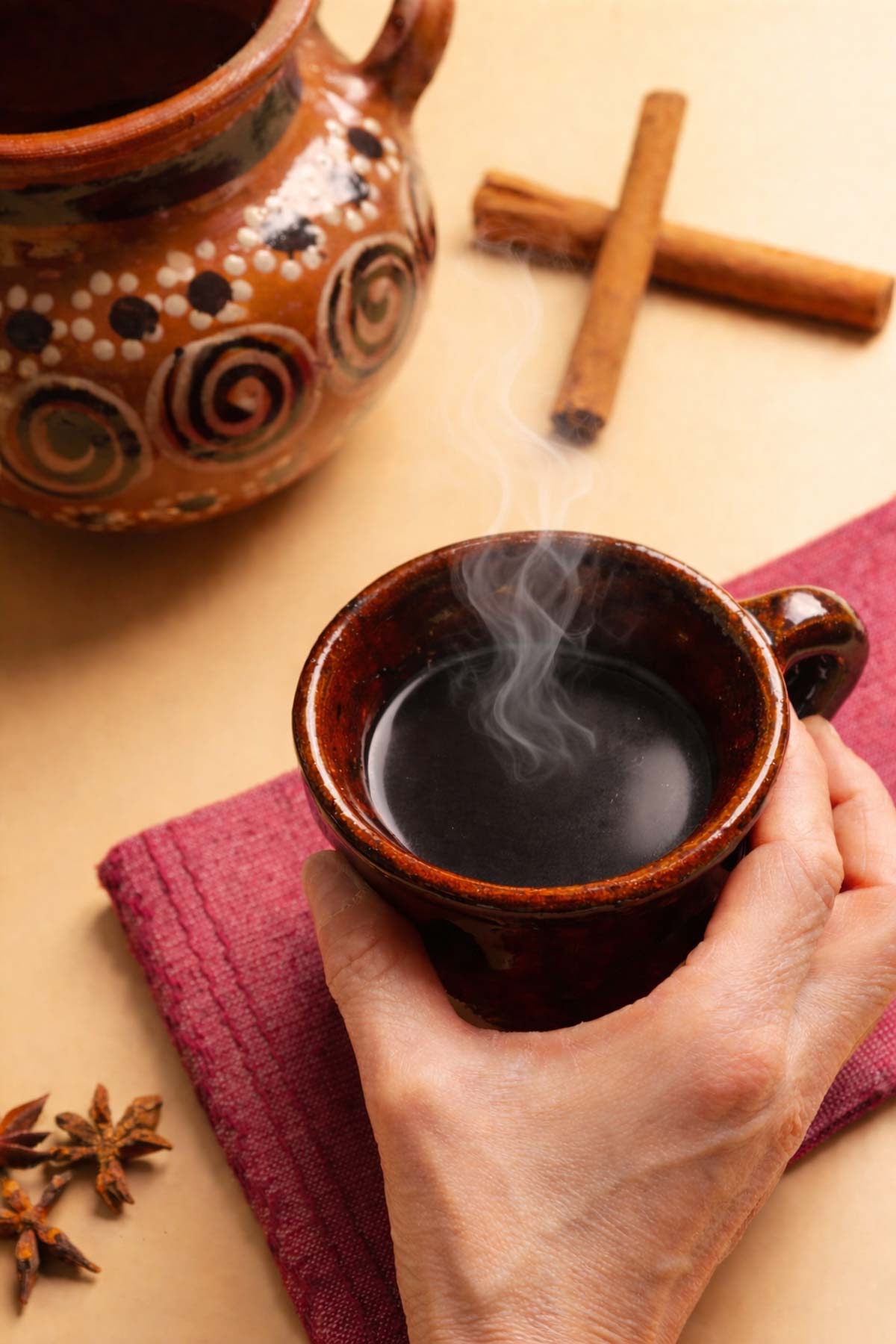 Cafe de Olla served in a clay mug.